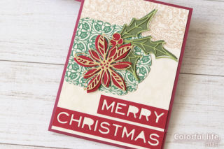 ビンテージのペーパーで、ポインセチアのクリスマスカード（アップ：Seasonal Sketch/Tim Hoitz）